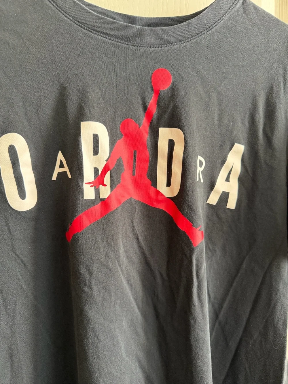 Jordan Black Short Sleeve Tee with Red Jumpman and White Jordan Text